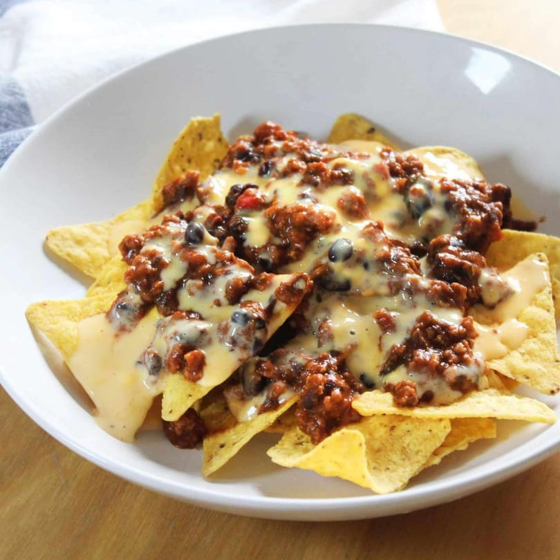 Dos Reales Latin Kitchen's nachos with melted cheese, ground beef, and black beans.